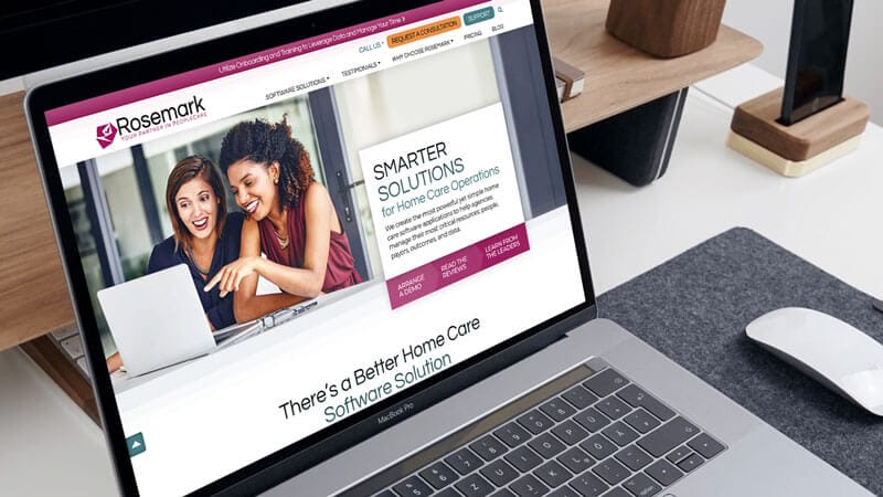 Rosemark System website home page on laptop